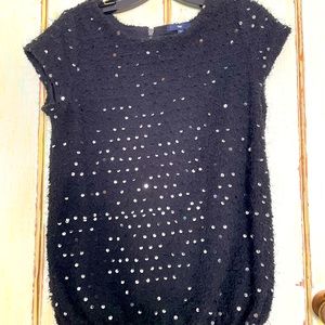 Gap black sequin short sleeve top with detail back zipper and elastic waist.